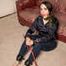 Zara in Blouse and Leather Cuffs