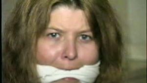 SEXY ONE IS WEARING A DOG COLLAR & CHAIN LEASH & GETS HER BARE FEET & TOES TIED & RUBBED (D35-16)