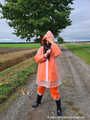 Miss Amira in AGU Adidas Regenanzug und transparentem Regenzeug