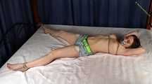 Bianca tied on bed