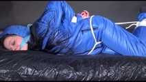 Lucy tied and gagged with ropes on bed wearing sexy blue oldschool downwear (Video)