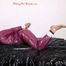Sophie in an shiny transparent purple PVC suit tied and gagged in bed (Pics)