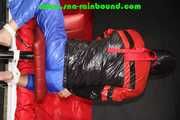 Sexy PIA wearing a sexy blue rainbib and a black/red shiny nylon rainjacket being tied, gagged and hooded on a chair with ropes and a ballgag (Pics)