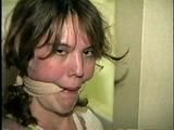SWEET SHY HEATHER IS MOUTH STUFFED, ACE BANDAGE CLEAVE GAGGED, BAREFOOT, TOES TIED AND BOUND TO A CHAIR (D46-13)