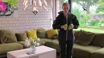 Rachel Adams bound and gagged by an Intruder in shiny Rainwear