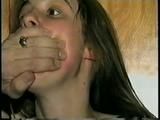  UK GIRL LISA IS MOUTH STUFFED, HANDGAGGED, WRIST GAGGED, RAWHIDE TIED & SELF HANDGAGGED (D42-13)