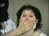 19 Yr OLD JENNIFER IS MOUTH STUFFED, TAPE GAGGED, TIED WITH ARMS OUT AND TO 2 PILLARS & CLEAVE GAGGED (D48-10)d, bondage