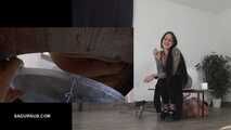 Mistress Cleo squirts cologne into the mouth of the slave lying in the toilet. Picture in Picture