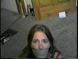 24 Yr OLD CRAFTER IS WRAP TAPE GAGGED, BAREFOOT TICKLED, TOE-TIED, BALL-TIED, HANDGAGGED & MOUTH STUFFED (D61-1)