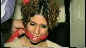 SWEET LATINA MARIE IS MOUTH STUFFED, HANDGAGGED, CLEAVE GAGGED, BLINDFOLDED & BARE FEET IN PLASTIC BAG (D42-1)