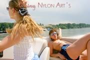 Stella and Leonie on a boat wearing sexy shiny nylon shorts and bikini tops (Pics)