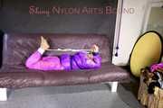 *** HOT HOT HOT*** NEW MODELL*** SANDRA wearing a sexy transparent purple shiny nylon pants and a purple down jacket tied and gagged on a sofa with ropes hand to feet and a cloth gag (Pics)