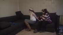 Elysa roped on couch 