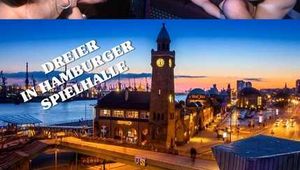 THREESOME IN HAMBURGER GAME HALL