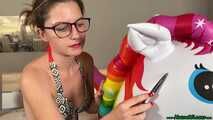 nail2pop promotional balloons on inflatable unicorn and destroying it with a pen