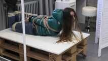 Poor Rey got catched by a mean couple which heavily tied and gagged her in her new shiny Down jacket. They stored her on a rolling table and gave her some bad news before Rey got tickeled, laughing in her pantygag.