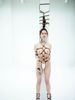 Kinbaku waitress in shiny metal