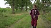 Miss Petra takes a walk in an AGU rain suit and rubber boots (looped version)