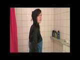 Get 2 Archive Videos with Alina enjoying her Shiny Nylon Rainwear