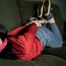 Raina in jeans and sofa 