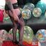 stomping balloons and beachballs with high heels