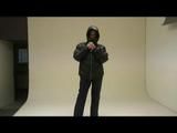 Stella posing infront of the camera wearing supersexy black rainwear and highheels (Video)