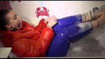 Jill ties and gagges herself in a bath tub for having an extraordinary experience wearing a sexy lightblue rainpants and an orange down jacket (Video)