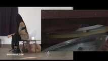 Mistress Cleo squirts cologne into the mouth of the slave lying in the toilet. Picture in Picture