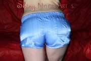 Watching ***NEW MODELL COURTNEY*** wearing a sexy lightblue shiny nylon shorts and a black top being tied and gagged overhead with ropes and a ballgag (Pics)