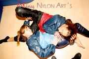 Stella and Leonie having fun with eachother wearing sexy shiny nylon rainwear (Pics)