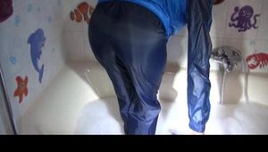 Sonja wearing sexy rainwear while taking a bath (Video)