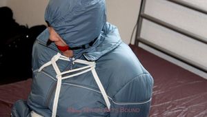 Jill tied and gagged in a shiny nylon oldschool skisuit