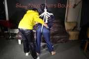 Sandra beeing tied and gagged by Stella in Shiny Nylon Rainwear crotchrope-suspended 