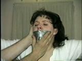19 Yr OLD JENNIFER IS MOUTH STUFFED, TAPE GAGGED, TIED WITH ARMS OUT AND TO 2 PILLARS & CLEAVE GAGGED (D48-10)d, bondage