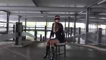 Stella on chair at car park 1/2