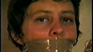 TINY TINA WRAP TAPE GAGGED & TIED UP WITH ELECTRICAL TAPE (D38-1)