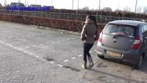 078014 Rachel Evans Pees Beside Her Car
