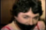 25 Yr OLD 2nd GRADE SCHOOL TEACHER IS MUMMY WRAPPED AND GAGGED WITH PLASTIC WRAP, BLACK ELECTRICAL TAPE AND SILVER DUCT TAPE ON A CHAIR (D68-13)