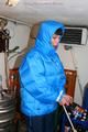 Jill tied and gagged in a down jacket