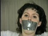 BALL-GAGGED, & TIED BETWEEN  2 PILLARS DAMSEL (D16-12)
