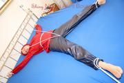 A nice cuty hooded, tied and gagged on bed