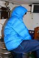 Jill tied and gagged in a down jacket