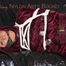 Lucy tied, gagged and hooded on a sofa wearing a sexy darkred downwear combination (Pics)