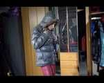 SANDRA putting on a sexy shiny nylon crazy sensation down suit infront of the mirror (Video)