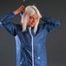 An archive girl dressing her up and posing in a studio wearing supersexy AGU oldschool rainwear (Pics)