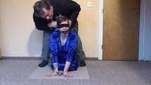 Sunny cuffed on the floor