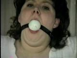 BALL-GAGGED, & TIED BETWEEN  2 PILLARS DAMSEL (D16-12)
