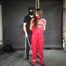 Marie bound, gagged and suspended in a shiny nylon Jumpsuit