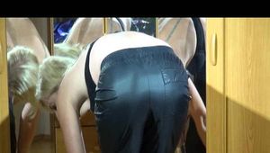 Pia wearing a supersexy black rain pants and a BH posing infront of the mirror (Video)