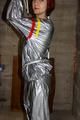 Nicole in an silver shiny PVC sauna suit tied and gagged in an cellar (Pics)